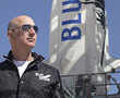Jeff Bezos heats up space race, aims Blue Origin commercial flight next year