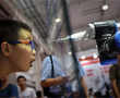 China shows off automated doctors, teachers and combat stars