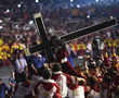 Thousands of Filipinos join procession to kiss statue of Jesus Christ