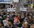 Tens of thousands in Hong Kong take message to mainlanders