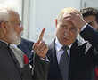 'Close friends' Putin and Modi vow to boost military, trade ties