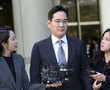 Samsung heir Lee appears in court for corruption retrial