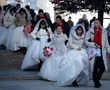 Mass snow wedding and crystal towers at China's ice fest