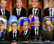 On magnets, mugs and matryoshka dolls, Putin's face still sells