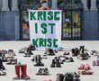 Shoes replace protesters as Swiss climate activists obey virus curbs