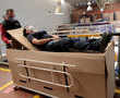 A hospital bed-coffin combo to serve the dead