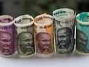 Rupee cracks below 68 against dollar on Karnataka cliffhanger