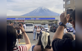 A Japanese town is blocking Mt Fuji view from 'badly-behaved' tourists