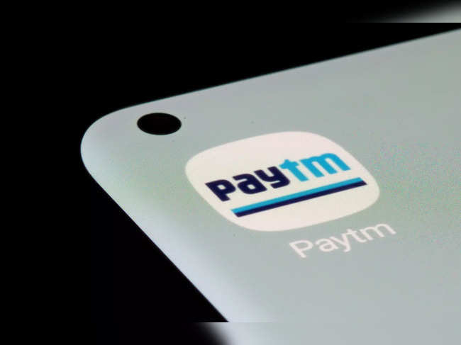 Paytm app is seen on a smartphone in this illustration