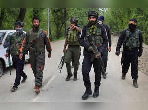 Baramulla: Security personnel at the site after an encounter with militants, in ...