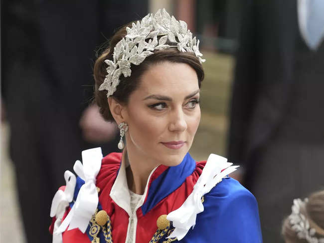 Kate Middleton ​completed her look with a headpiece made of silver and crystal leaves instead of a tiara.​