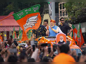 Bengaluru: Prime Minister Narendra Modi during a roadshow ahead of Karnataka Ass...