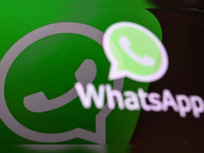 This illustration photograph taken on April 11, 2023, shows the US instant messaging software Whatsapp's logo on a smartphone screen in Moscow.  (Photo by Kirill KUDRYAVTSEV / AFP)