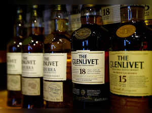 FILE PHOTO: Bottles of single malt scotch whisky The Glenlivet, part of the Pernod Ricard group, are pictured in a shop near Lausanne