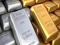 Gold jumps Rs 450; silver declines Rs 380