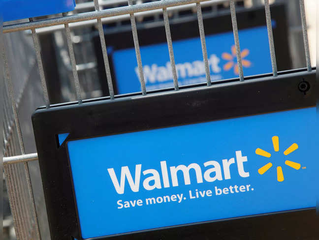 FILE PHOTO: Shopping carts are seen outside a new Walmart Express store in Chicago