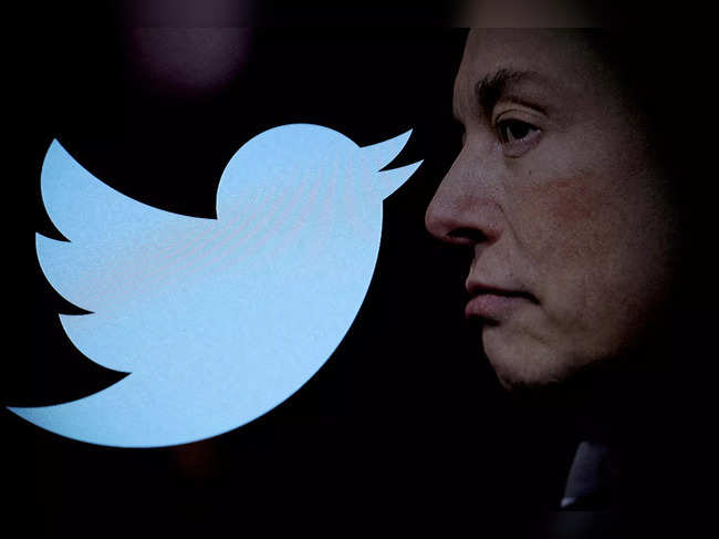 FILE PHOTO: Illustration shows Elon Musk photo and Twitter logo