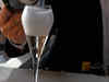 Why bubbles in a glass of champagne, or sparkling wine, go straight up?