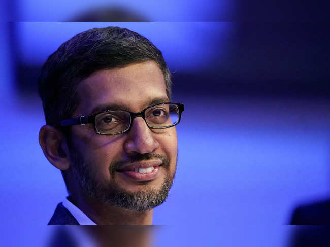 FILE PHOTO: Sundar Pichai, chief executive officer of Alphabet, looks on during a session in Davos
