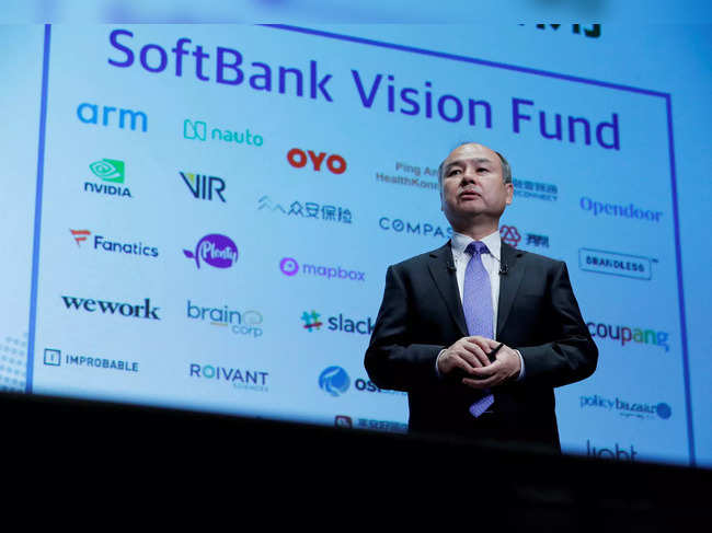 FILE PHOTO: Japan's SoftBank Group Corp Chief Executive Masayoshi Son attends a news conference in Tokyo