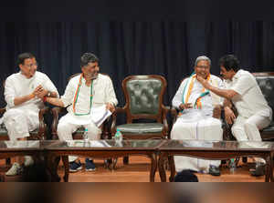 Bengaluru: Congress leaders Randeep Singh Surjewala, Siddaramaiah, D.K. Shivakum...