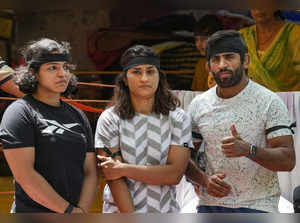 New Delhi: Wrestlers Bajrang Punia, Vinesh Phogat and Sakshi Malik during their ...