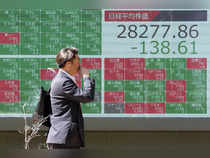 Japan's Nikkei hits 18-month high as investors cheer earnings