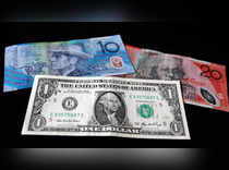Dollar firms on optimism over US debt ceiling talks, Aussie down after jobs data