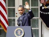 Barack Obama waves after talking about cutting the US deficit