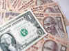 Rupee gains on possible dollar inflows, eyes Fed minutes