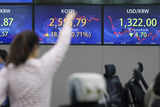 Asian stocks limp toward US debt denouement; Japan sparkles