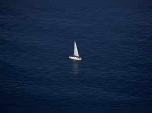 FILE PHOTO: A sailboat is pictured sailing in the Mediterranean sea, from the Rock, in the British overseas territory of Gibraltar, south of Spain