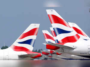FILE PHOTO: British Airways tail fins are pictured at Heathrow Airport in London