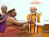 Adheenam seers at PM's residence, Modi receives ceremonial Sengol from them