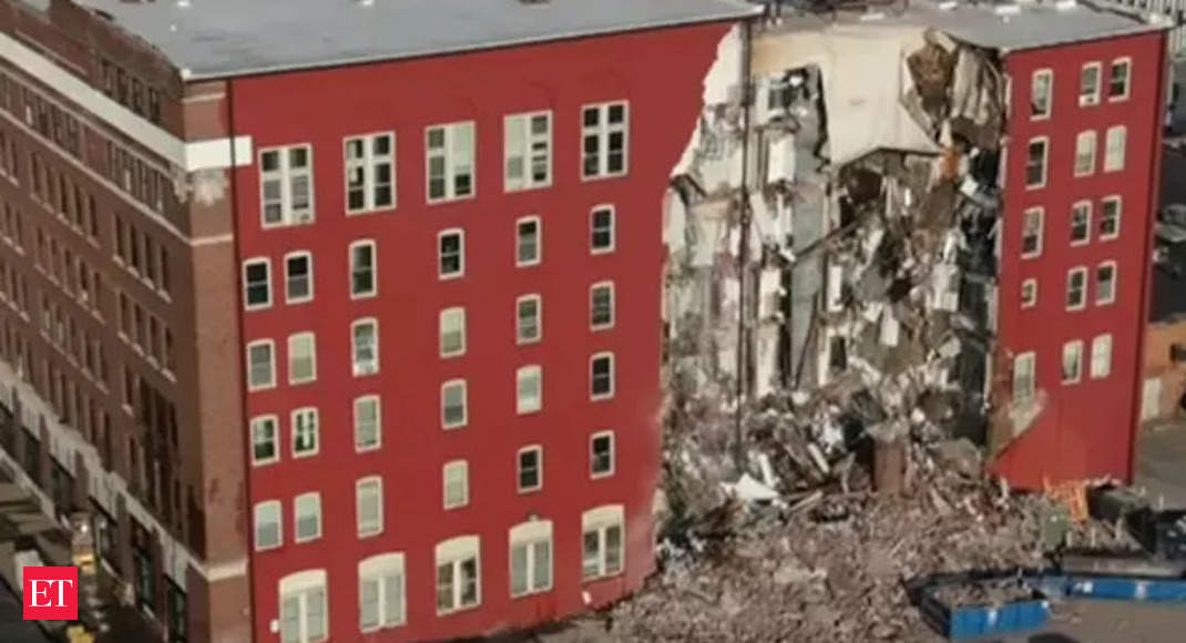 US: Rescue operations underway after apartment building partially ...