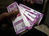 Rupee ends lower, forward premiums tumble