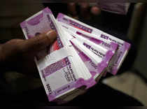 Indian rupee ends lower, forward premiums tumble