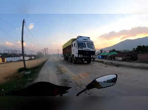 A view of a truck with its windshield broken, in Manipur