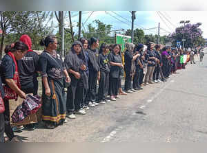 Churachandpur: Kuki tribals take part in a rally during the visit of Union Home ...