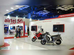 New Delhi_ Electric two-wheelers on display at a stall during the 6th India Mobi....