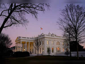 FILE PHOTO: The White House is seen at sunset on U.S. President Joe Biden's first day in office in Washington