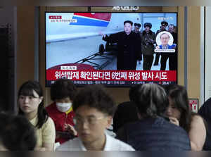 A TV screen shows a file image of North Korean leader Kim Jong Un during a news ...