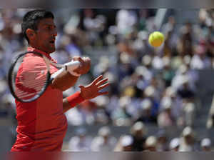 Serbia's Novak Djokovic plays a shot against Peru's Juan Pablo Varillas during t...