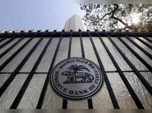 FILE PHOTO: The Reserve Bank of India (RBI) seal is pictured on a gate outside the RBI headquarters in Mumbai