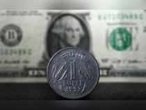 Rupee rises 7 paise to 82.56 against US dollar