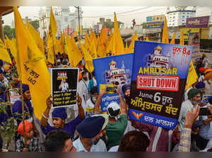 Amritsar: Activists of the Dal Khalsa Sikh organisation participate in a march o...