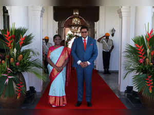 India's President Droupadi Murmu (L) and Suriname's President Chan Santokhi stand during the welcoming ceremony at the presidential palace in Paramaribo, on June 5, 2023. Murmu is in Suriname from June 4-6 to commemorate the 150th East Indian Immigration, her first state visit since assuming office in July last year. (Photo by Ranu ABHELAKH / AFP)