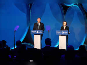 Organisation for Economic Co-operation and Development (OECD) Secretary-General Mathias Cormann (L) and OECD chief economist Clare Lombardelli deliver a press conference to present the organisation's updated global economic outlook, in Paris, on June 7, 2023. The OECD slightly raised its growth outlook for the world economy on June 7 as inflation eases and China has dropped Covid restrictions, but it warned the recovery faces a "long road". The Paris-based organisation forecast an economic expansion of 2.7 percent, up from 2.6 percent in its previous report in March, with upgrades for the United States, China and the eurozone. (Photo by AFP)