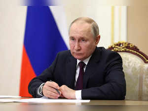 Russian President Vladimir Putin chairs a meeting in Moscow