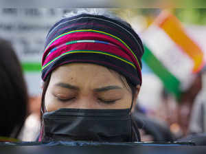 New Delhi: A tribal woman of Manipur take part in a ‘Tribal Solidarity protest’ ...